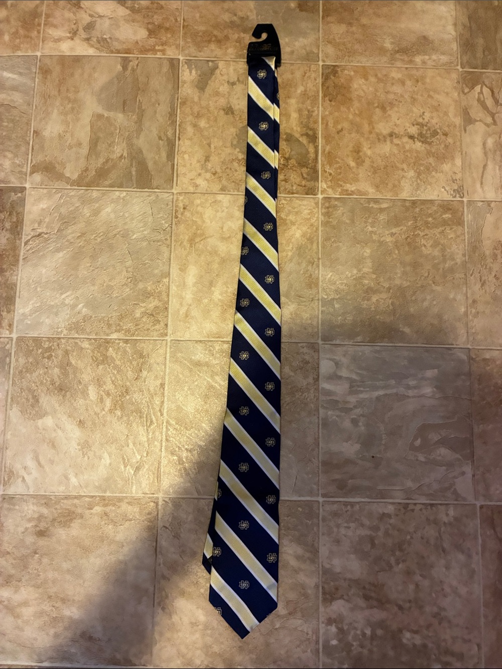 Brooks Brothers Navy Blue and Yellow Striped Silk Tie with Crest